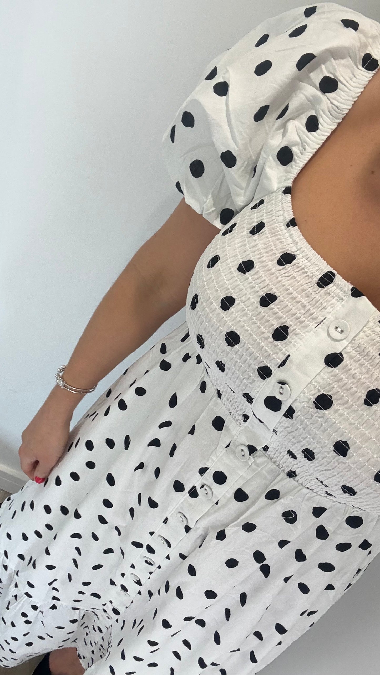 BLACK POLKA DOT SHIRRED MIDI DRESS