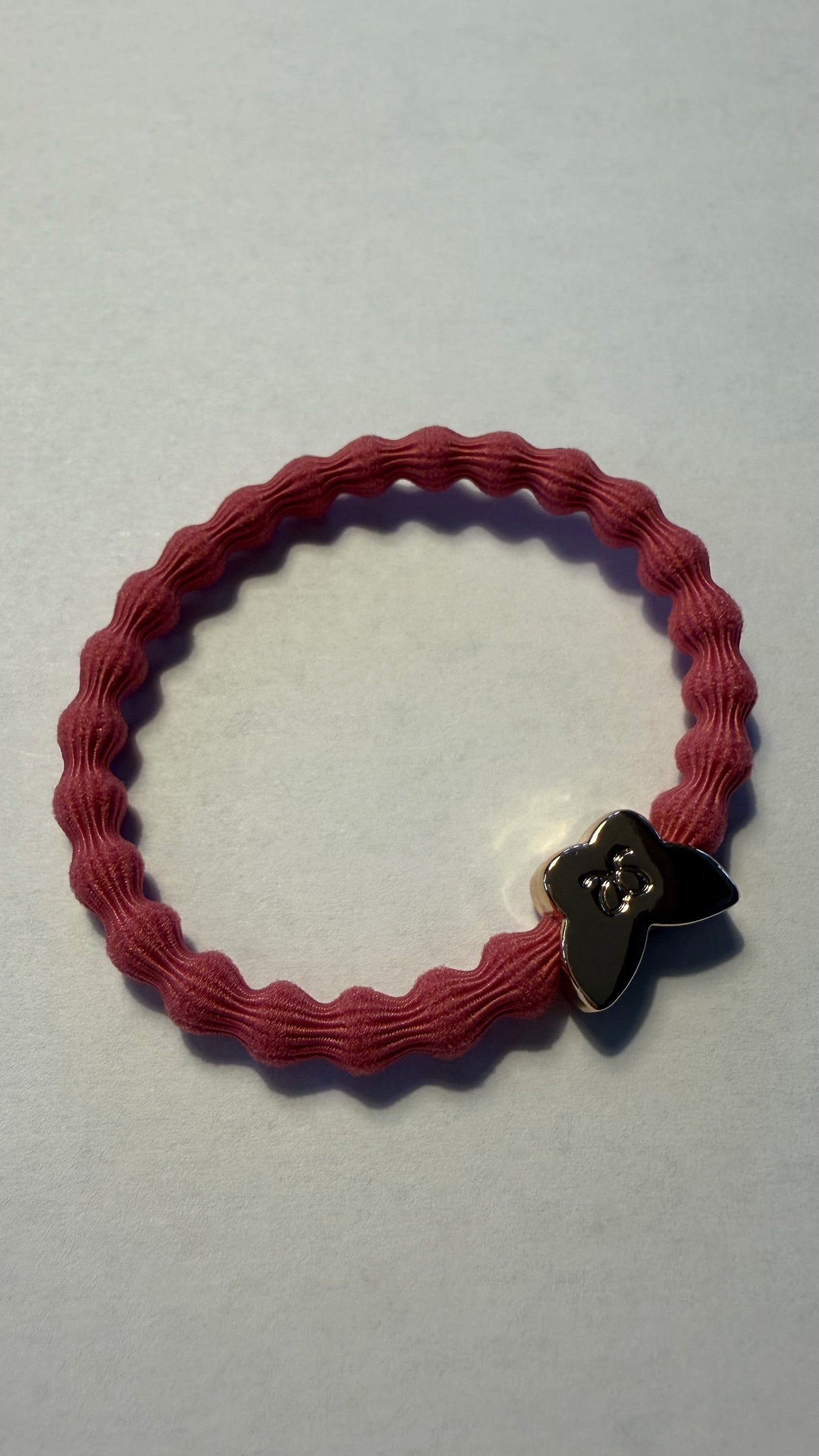 BYELOISE CORAL PINK BANGLE BAND WITH GOLD BUTTERFLY CHARM