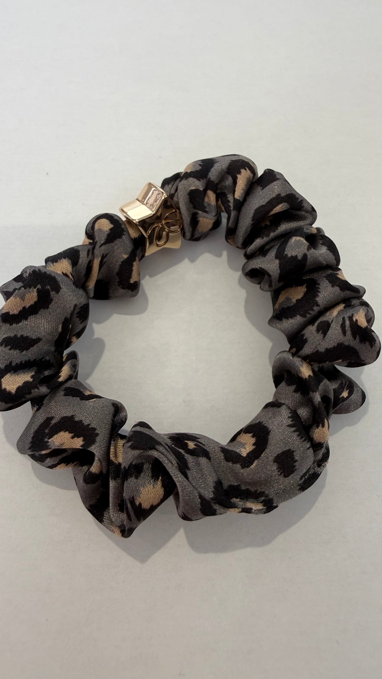 BYELOISE MULBERRY SILK SCRUNCHIE - GREY LEOPARD WITH GOLD STAR CHARM
