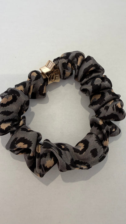 BYELOISE MULBERRY SILK SCRUNCHIE - GREY LEOPARD WITH GOLD STAR CHARM