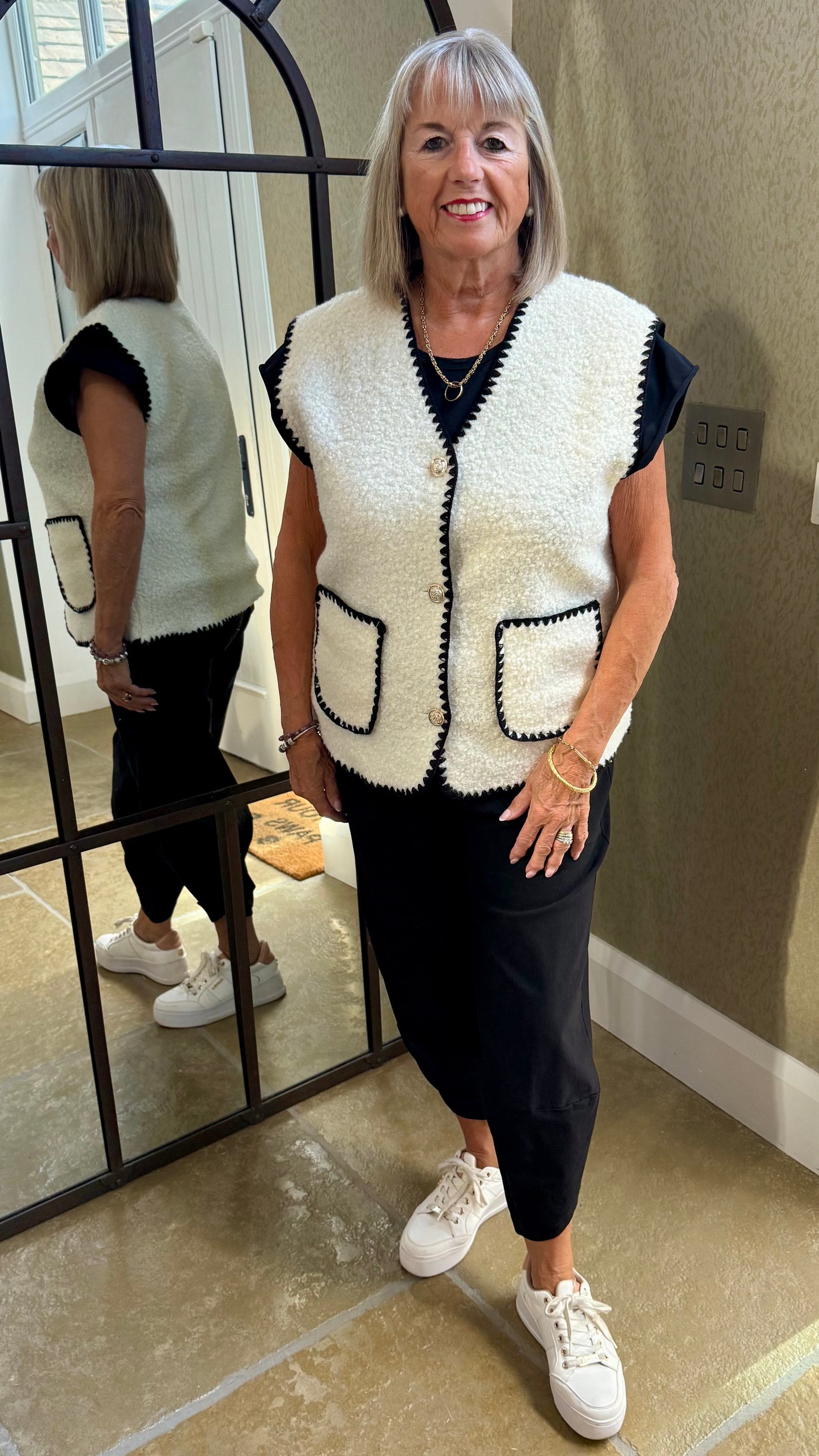 CREAM BOUCLE SLEEVELESS GILET WITH BLACK EDGING