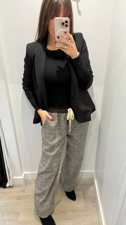 CHECKED WIDE-LEG TROUSERS WITH CHOCOLATE WAISTBAND