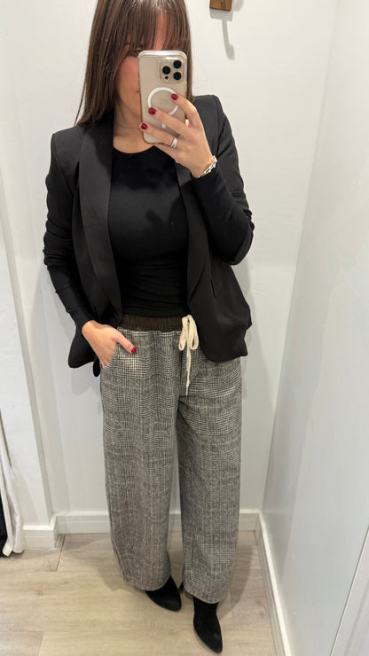 CHECKED WIDE-LEG TROUSERS WITH CHOCOLATE WAISTBAND