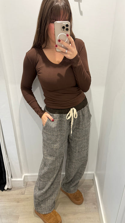 CHECKED WIDE-LEG TROUSERS WITH CHOCOLATE WAISTBAND