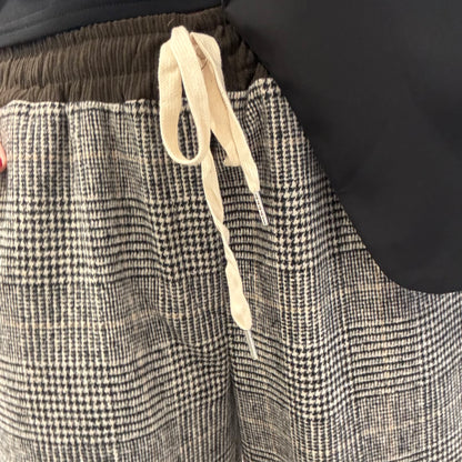 CHECKED WIDE-LEG TROUSERS WITH CHOCOLATE WAISTBAND