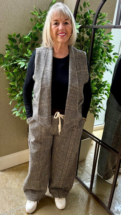 CHECKED WIDE-LEG TROUSERS WITH CHOCOLATE WAISTBAND