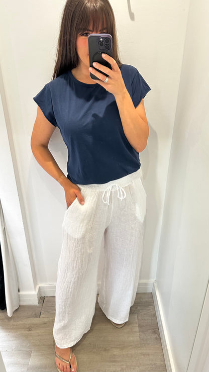 WHITE LINEN WIDE LEG TROUSERS