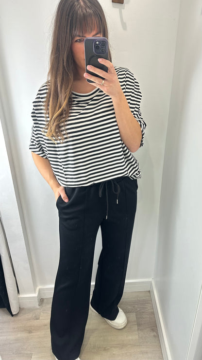 BLACK AND WHITE STRIPED BATWING PLEATED SHOULDER TOP