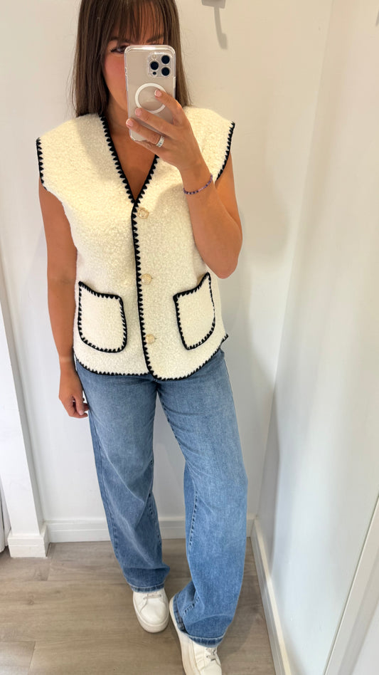 CREAM BOUCLE SLEEVELESS GILET WITH BLACK EDGING