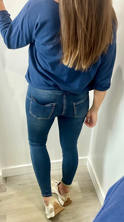 MID WASH TOCADO JEANS