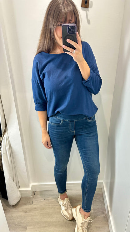 MID WASH TOCADO JEANS