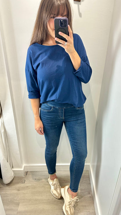 MID WASH TOCADO JEANS