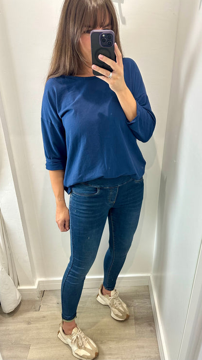 MID WASH TOCADO JEANS