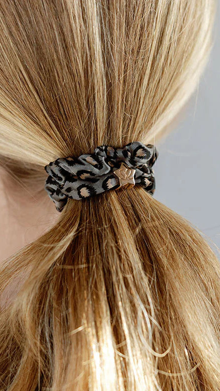 BYELOISE MULBERRY SILK SCRUNCHIE - GREY LEOPARD WITH GOLD STAR CHARM