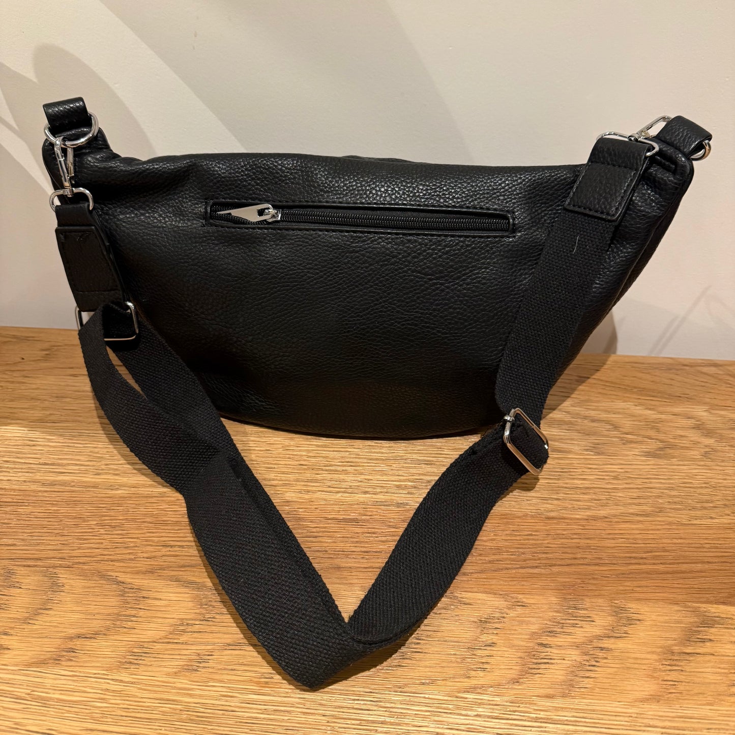 THE SOFT CURVE CROSSBODY SLING BAG – BLACK WITH AZTEC STRAP