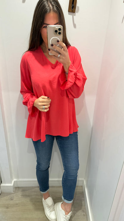 CORAL FRILL CUFF V-NECK BLOUSE