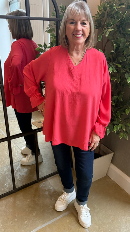 CORAL FRILL CUFF V-NECK BLOUSE