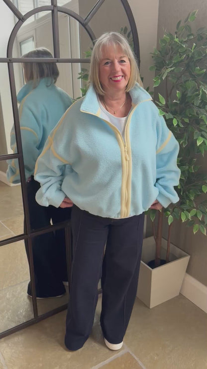POWDER BLUE ZIP THROUGH FLEECE